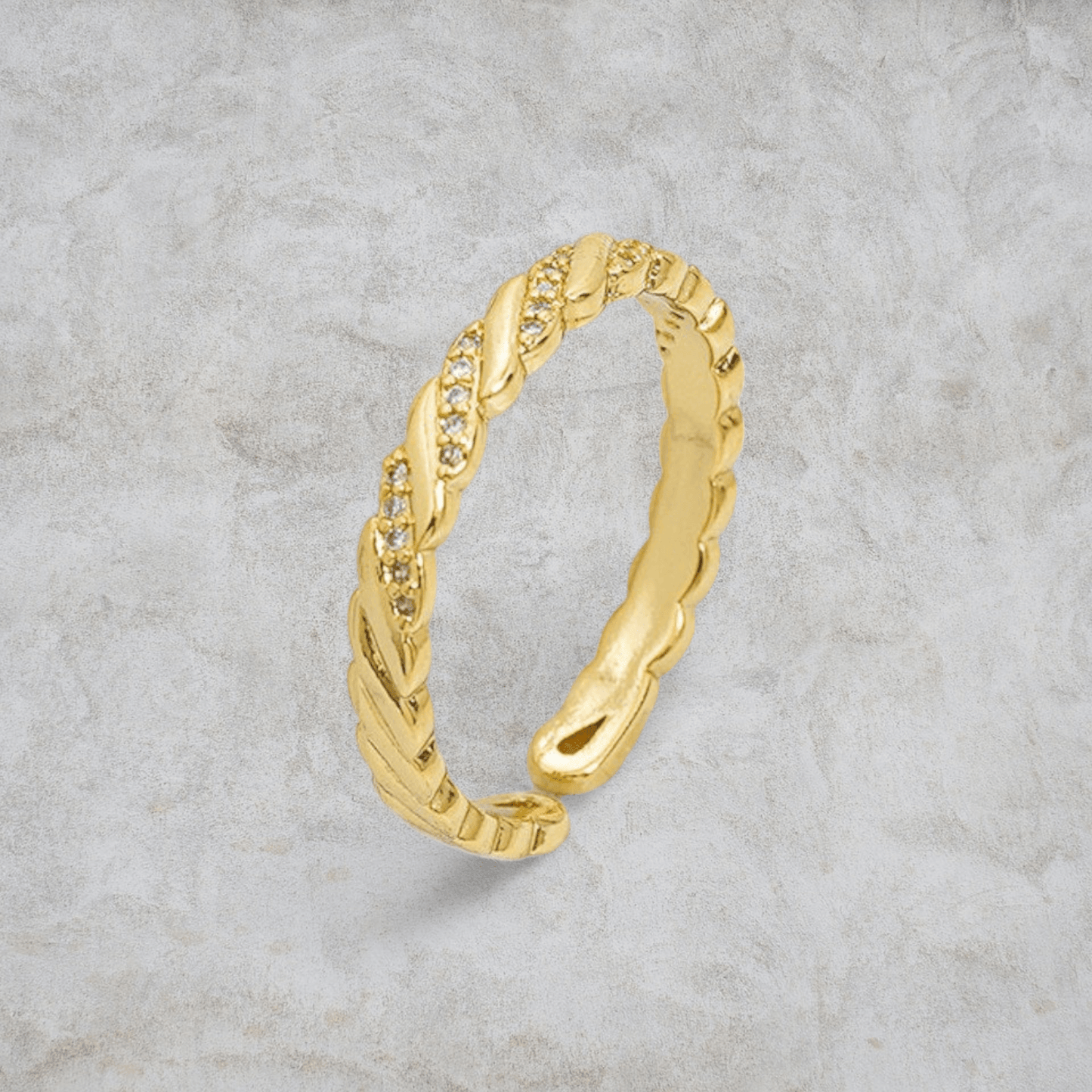 Anillo cruzado con piedras- J13035
